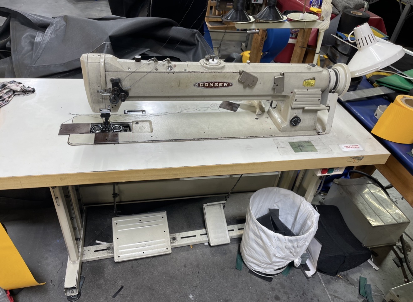 Sewing machine mechanical servicing and thread cutter repair