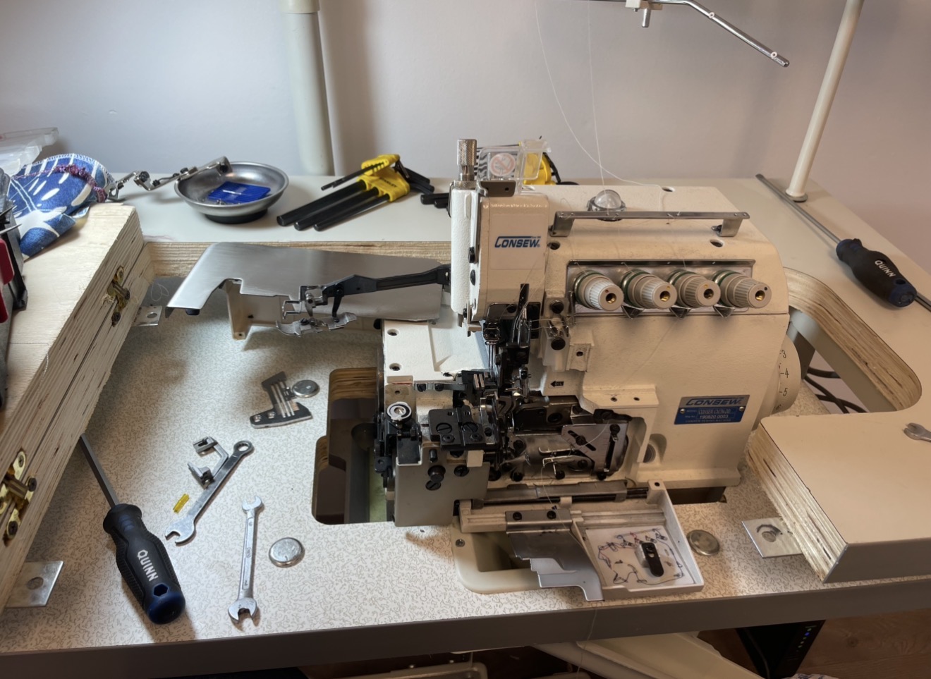 Industrial machine repair inspection for quilting and embroidery
